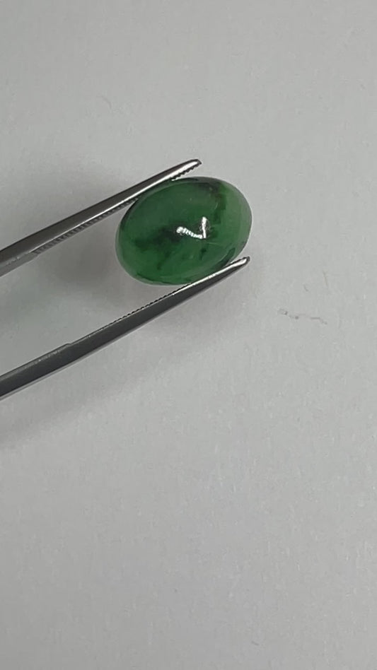 7.34ct Vivid Green Jadeite Cabochon with Mottling, Myanmar