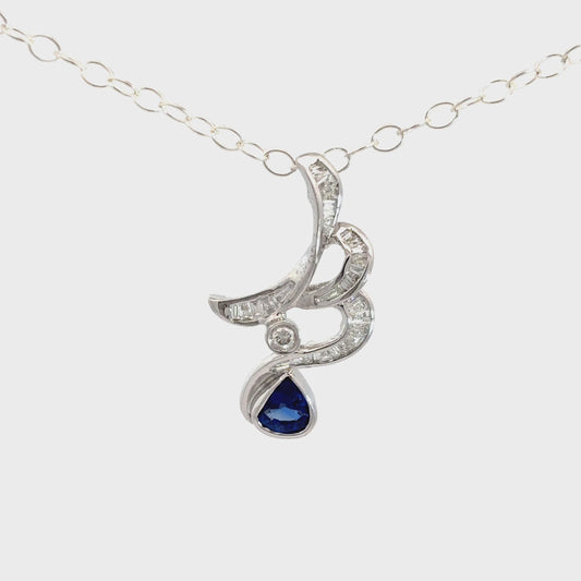 Sapphire Gold Pendant with Wind Wave Motif